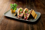 Spicy Pomegranate Molasses Steak Tacos